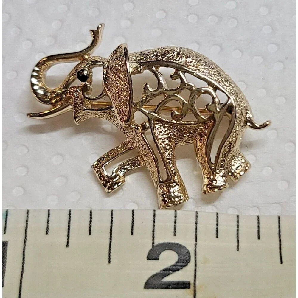 Vintage Sarah Coventry Cut Our Gold Tone Elephant Brooch